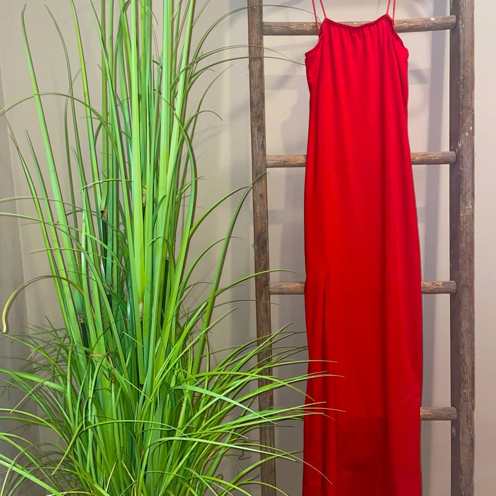 Red spaghetti strap body con dress with slit. Soft material very flattering. 🌹
